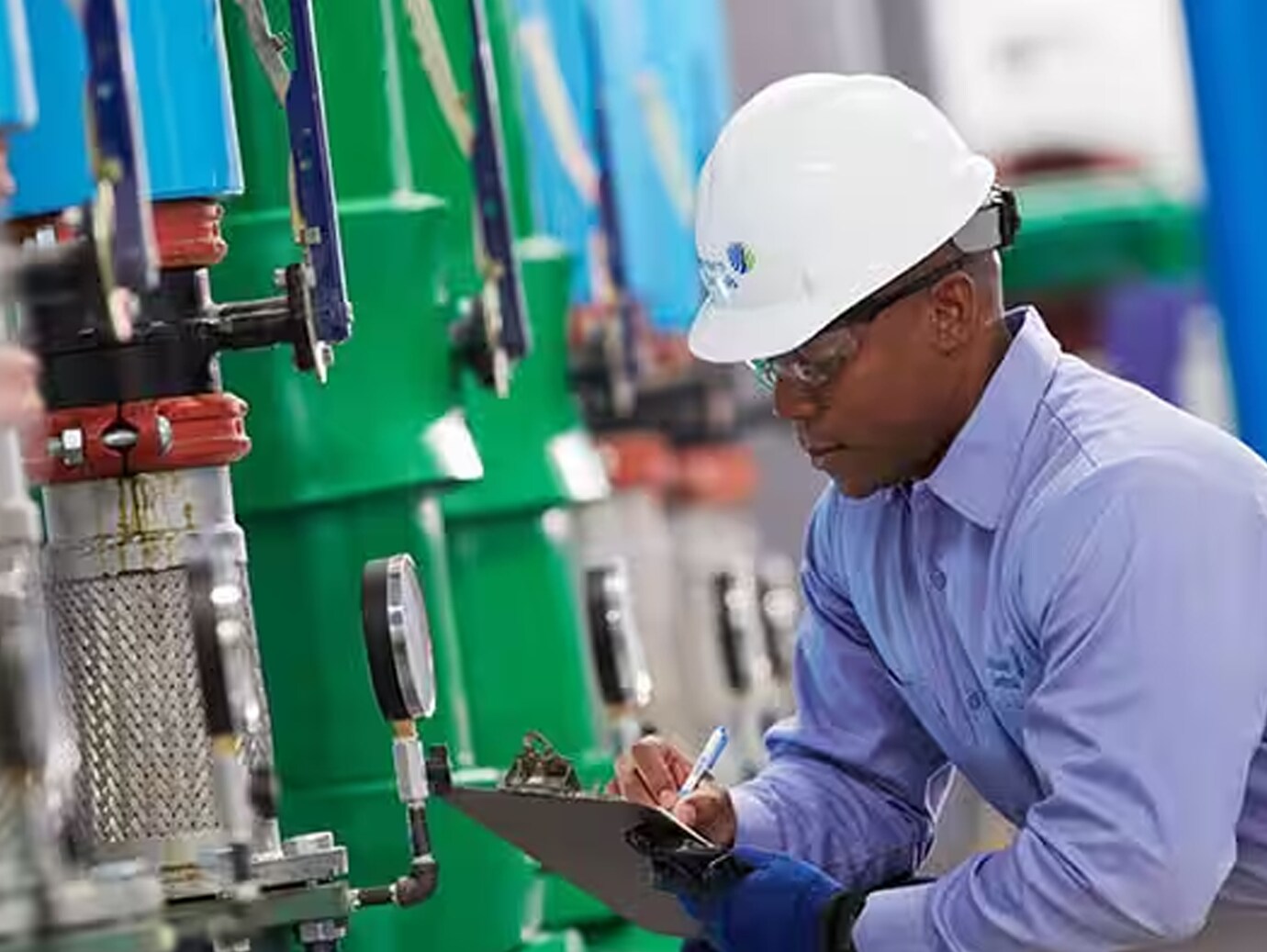 Johnson Controls technician inspecting HVAC equipment